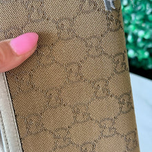 Load image into Gallery viewer, GUCCI Metallic Monogram Zippy Wallet