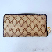 Load image into Gallery viewer, GUCCI GG Monogram Canvas Zippy Wallet