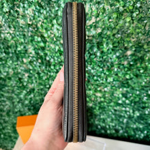 Load image into Gallery viewer, Louis Vuitton Lambskin Embossed Monogram Coussin Zippy Wallet