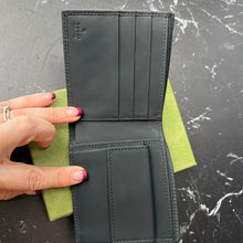 Load image into Gallery viewer, Gucci Rubber Effect GG Embossed Men's Bi-Fold Wallet