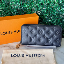Load image into Gallery viewer, Louis Vuitton Lambskin Embossed Monogram Coussin Zippy Wallet