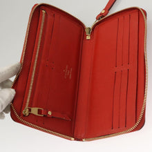 Load image into Gallery viewer, Louis Vuitton Empreinte Zippy Wallet Orange