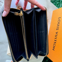 Load image into Gallery viewer, Louis Vuitton Lambskin Embossed Monogram Coussin Zippy Wallet
