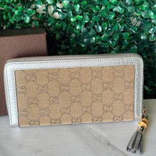 Load image into Gallery viewer, GUCCI Metallic Monogram Zippy Wallet