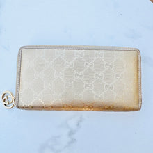 Load image into Gallery viewer, GUCCI Metallic Gold Shiny Monogram Zippy Wallet