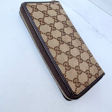Load image into Gallery viewer, GUCCI GG Monogram Canvas Zippy Wallet
