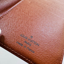 Load image into Gallery viewer, Louis Vuitton Monogram Vertical Bifold Wallet
