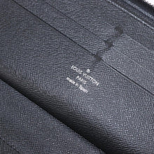 Load image into Gallery viewer, Louis Vuitton Monogram Logo Story Zippy Organizer Wallet
