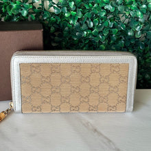 Load image into Gallery viewer, GUCCI Metallic Monogram Zippy Wallet
