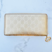 Load image into Gallery viewer, GUCCI Metallic Gold Shiny Monogram Zippy Wallet
