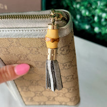Load image into Gallery viewer, GUCCI Metallic Monogram Zippy Wallet

