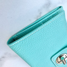 Load image into Gallery viewer, Tiffany &amp; Co. Leather Turnlock Wallet
