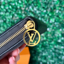 Load image into Gallery viewer, Louis Vuitton Lambskin Embossed Monogram Coussin Zippy Wallet
