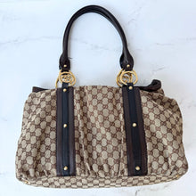 Load image into Gallery viewer, Gucci GG Monogram Interlocking Icon Weekender Bag

