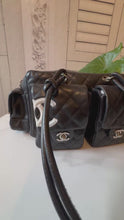 Load and play video in Gallery viewer, CHANEL Calfskin Quilted Large Cambon Multipocket Reporter
